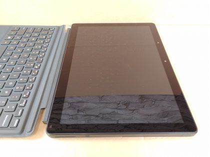 There is some wear from the keyboard on the screen (View image 9)