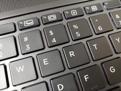 There is a tiny minor cosmetic crack in between the R & 5 key (View image 9)