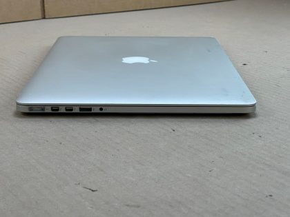 Macbook pro powers and boots normally. Battery has a low cycle count but will not charge