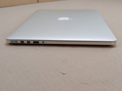 power cord and the bottom screws. Battery has a very low cycle count