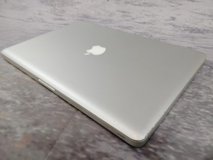 we have added actual images to this listing of the Apple Macbook Pro you would receive. Clean install of 10.13.6 (High Sierra) Operating system. May have some minor scratches/dents/scuffs. OSX Default Password: 123456. [ What is included: Apple Macbook Pro + Power Cord + 30-Day Warranty Included ]Item Specifics: MPN : MC723LL/AUPC : N/ABrand : AppleProduct Family : MacBook ProRelease Year : Early 2011Screen Size : 15-inchProcessor Type : Intel Core i7Processor Speed : 2.0GHzMemory : 8GB 1333MHz DDR3Storage : 512GB SSDOperating System : 10.13.6 OS X High SierraColor : SilverType : Laptop - 5