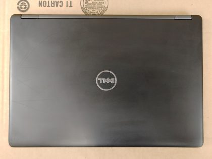 Does seem to hold a decent charge. May have a few minor cosmetic scratches/scuffs. **NO POWER ADAPTER INCLUDED**  For your help