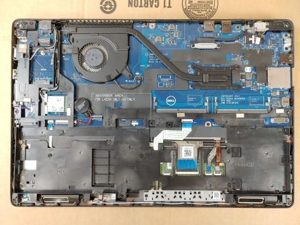 **NO BATTERY/NO SSD/NO RAM** There is signs of liquid spill on the inside of the bottom plate