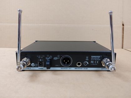 Good Condition! Tested and pulled from a working environment! May have minor cosmetic scratches/scuffs from normal use.  Whats pictured is what you'll receive! **NO POWER ADAPTER INCLUDED**Item Specifics: MPN : SLX4 H5UPC : N/ABrand : SHUREType : Microphone ReceiverModel : SLX4 H5Connectivity : WirelessMicrophone Form Factor : Microphone RecevierFeatures : Built-in Antenna - 4