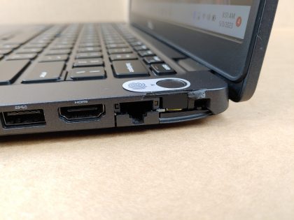 There is a chunk of plastic broke off on the right side of the laptop (View image 9)