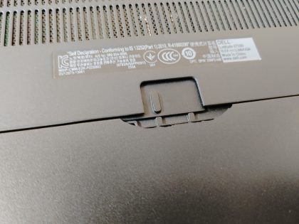 but stays in as it should (View image 8). Small piece of rubber tore off from abover the LCD. Palmrest has some wear. Boots to the BIOs. May have a few minor cosmetic scratches/scuffs. **NO POWER ADAPTER INCLUDED**  For your help