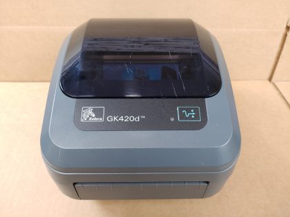 Good Condition! Has some minor cosmetic scratches/scuffs from normal use. **NO POWER ADAPTER / CABLES OR LABELS INCLUDED**Item Specifics: MPN : GK42-202210-000UPC : N/ATechnology : ThermalPrinter Type : Label PrinterOutput Type : Black and WhiteBrand : ZebraModel : GK420dType : Label Printer - 1