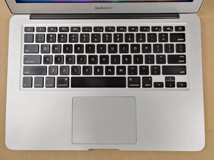 There is a few tiny very faint pressure marks in the lower right cornre of the screen (View image 9). There is a thin faint wear spot from the keyboard