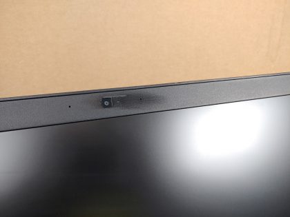 doesn't effect the camera (View image 8). Tested and Working as it should. Boots to the BIOs. May have a few minor cosmetic scratches/scuffs. For your help