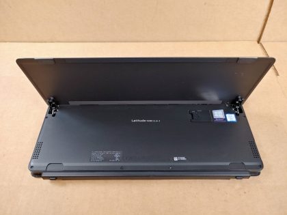 There is some screen wear from the keyboard and a few small scratches (View image 8). Fully Tested & 100% Functional ready to use out of the box