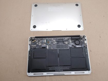 the screen has a distorted area in the middle of the screen as shown in image 8 and 10. Bottom of the macbook is missing all of the screws. No power cord.Item Specifics: MPN : Apple Macbook Air 11 2011UPC : NABrand : AppleProduct Family : Macbook AirRelease Year : 2011Screen Size : 11 inProcessor Type : Intel Core i5Processor Speed : 1.6 GhzMemory : 2 GBStorage : 64 GBOperating System : El CapitanType : Laptop - 3