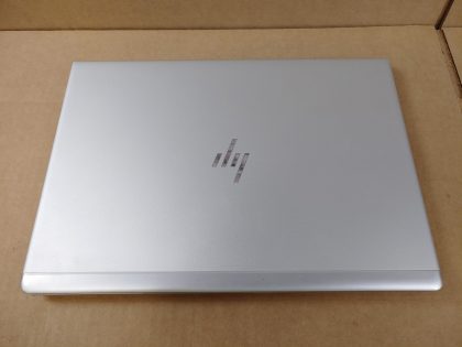 **NO POWER ADAPTER**  The corner of the lid has a cosmetic blemish causing the bezel to seperate a tiny bit (View image 8). The corner of the palmrest also has a cosmetic blemish (View image 9). Tested and Working as it should. Clean install of Windows 11 Pro Operating system. May have a few minor cosmetic scratches/scuffs. For your help