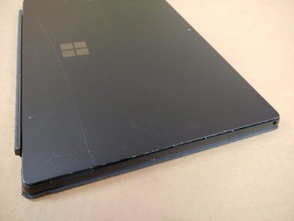 The back and around the edges have some scratches and scuffs (View images 9 & 10). Screen is in great shape! Fully Tested & 100% Functional ready to use out of the box