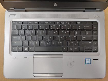 **NO OS / NO POWER ADAPTER** The screen has some wear from the keyboard (View image 8). There is a cosmetic chip in the front corner