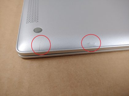 glass is good and not cracked (View image 9). There is also 2 cosmetic cracks in the bottom plate (View image 10). The middle of the HP logo on the top is missing (View image 6). Fully Tested & 100% Functional ready to use out of the box