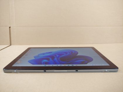 There is some light scratches in the upper left and right side of the screen (View images 8 & 9). The speakers are a bit crackly when turned all the way up. Fully Tested & 100% Functional ready to use out of the box