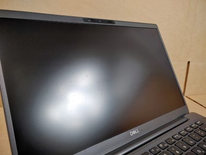 There is a handful of little specks of wear on the screen from the keyboard (View image 9). The hinges are a little loose but the lid still stays up as it should. Tested and Working as it should. Boots to the BIOs. May have a few minor cosmetic scratches/scuffs. For your help