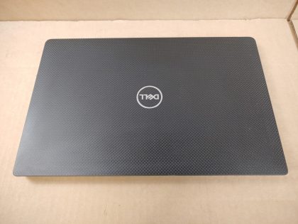 The screen has some faint specks of wear from the keyboard (View image 8)