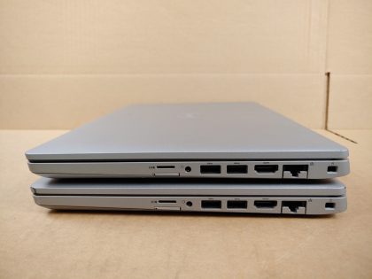 LOT of 2 - Both Latitudes have& ;a very faint pressure mark in the bottom right corner of the screens (View images 9 & 10). They have some minor scratches on the top and bottom. Both have a black spot on the bottom from a sticker being removed. Fully Tested & 100% Functional ready to use out of the box