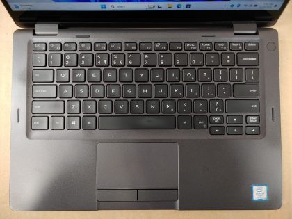 *NO POWER ADAPTER INCLUDED* The screen has a bit of wear from the keyboard (View image 8). There is some wear on the keyboard (View image 4). There is a tiny hairline crack in the plastic in the SC slot (View image 9). Fully Tested & 100% Functional ready to use out of the box