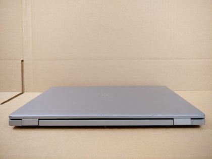 has to be plugged in via Type-C to charge laptop. There is a black spot on the bottom from a sticker being removed. Boots to the BIOs. May have a few minor cosmetic scratches/scuffs. For your help