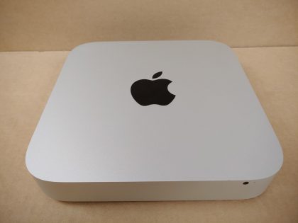 please use any TV or Monitor of your choice with this Mac Mini. For your help