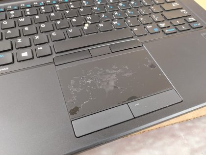 **NO POWER ADAPTER/ NO OS** There is a chunk of plastic broke off the lid (View image 8). The touchpad has wear (View image 9). There is a small crack in the top right corner of the bezel (View image 12). There is a small amount of wear from the keyboard on the screen. May have a few minor cosmetic scratches/scuffs. For your help