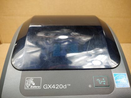 Good Condition! There is some minor scratches/scuffs from normal use. Tested and pulled from a working environment! **POWER ADAPTER INCLUDED**Item Specifics: MPN : GX420dUPC : N/ATechnology : ThermalPrinter Type : Direct ThermalOutput Type : Black / WhiteBrand : ZebraModel : GX420d / GX42-202412-000Product Line : Zebra GPrint Speed : Up to 6"/152 mm per secondType : Label PrinterScanning Resolution : 203 dpi (8 dots/mm) - 7