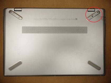 The charge light comes on when plugged in but DOES NOT POWER. Screen looks to be in good condition with no signs of cracks. Bottom plate is missing all the screws