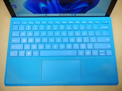 **NO POWER ADAPTER INCLUDED** The felt on the magnetic part of the keyboard cover is blemished (View image 7). Fully Tested & 100% Functional ready to use out of the box