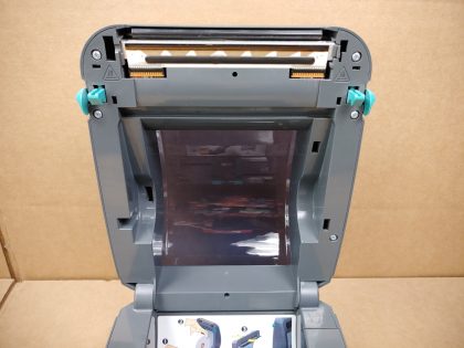 Good Condition! There is some minor scratches/scuffs from normal use. Tested and pulled from a working environment! **POWER ADAPTER INCLUDED**Item Specifics: MPN : GX420dUPC : N/ATechnology : ThermalPrinter Type : Direct ThermalOutput Type : Black / WhiteBrand : ZebraModel : GX420d / GX42-202412-000Product Line : Zebra GBlack Print Speed : Up to 6"/152 mm per secondType : Label PrinterScanning Resolution : 203 dpi (8 dots/mm) - 10