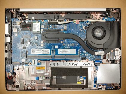 **NO POWER (DOA). LAPTOP DOES NOT POWER. The top left corner of the screen bezel is damaged
