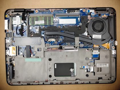 The palmrest has some minor wear (View image 4). Bottom plate is missing some screws (View image 6). Tested and Working. Boots to the BIOs. May have a few minor cosmetic scratches/scuffs. For your help
