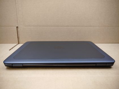 but stays in place with the screw (View image 9). There is a tiny hairline crack in between the S and X keys (View image 10). There is also some dust behind the glass in the bottom left corner of the screen. Tested and Working. Boots to the BIOs. May have a few minor cosmetic scratches/scuffs. For your help