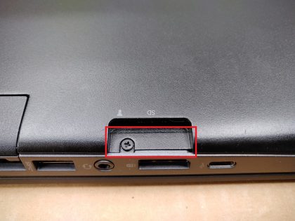The plastic inside the display port is broke out. Bottom plate is missing screws (View image 6). The metal in the SD card slot thats screwed down is broke off and not attached to the base