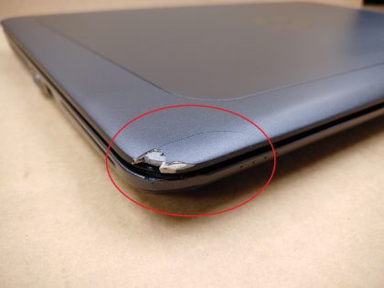 but stays in place with the screw (View image 9). The front left corner of the lid and palmrest are damaged (View images 10 & 11). There is some dust behind the glass. Tested and Working. Boots to the BIOs. May have a few minor cosmetic scratches/scuffs. For your help