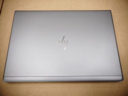 There is a small crack in the top corner of& ;the lid (View images 9 & 10). Both top corners of the screen bezel are separated from the lid a little from being damaged (View image 11). There i some some very minor screen wear from the keyboard. Tested and Working. Boots to the BIOs. May have a few minor cosmetic scratches/scuffs. For your help