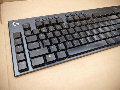 Great Condition! Tested and pulled from a working environment.May have some cosmetic light scratches/scuffs. **NO DONGLE OR CABLE INCLUDED**Item Specifics: MPN : Y-R0069UPC : N/AKeyboard/Keypad : QWERTY (Standard)Type : Gaming KeyboardConnectivity : Wireless / BluetoothFeatures : IlluminatedBrand : LogitechModel : G915 / Y-R0069 - 2