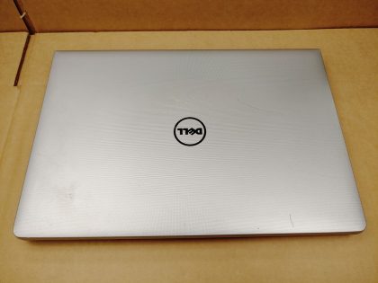 There is a crack in the top left corner of the screen bezel (View image 8). There is also a small crack in the middle of the lid on the top/edge (View image 9). Tested and Working. Boots to the BIOs. May have a few minor cosmetic scratches/scuffs. For your help