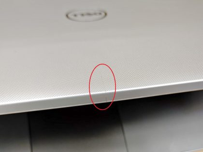 There is a crack in the top left corner of the screen bezel (View image 8). There is also a small crack in the middle of the lid on the top/edge (View image 9). Tested and Working. Boots to the BIOs. May have a few minor cosmetic scratches/scuffs. For your help