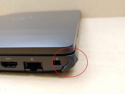 The back left corner of the laptop is damaged (View image 9). There is also some small hairline cracks in the bottom plate (View image 6). Tested and Working. Boots to the BIOs. May have a few minor cosmetic scratches/scuffs. For your help