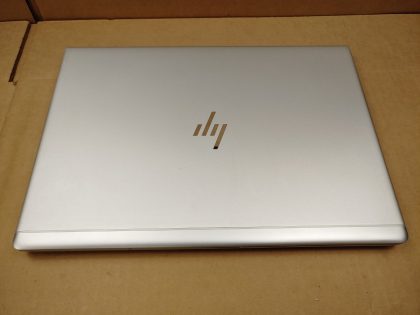 The front corner or the palmrest is slightly dented (View image 9). The screen has some light wear from the keyboard. Tested and Working. Boots to the BIOs. May have a few minor cosmetic scratches/scuffs. For your help