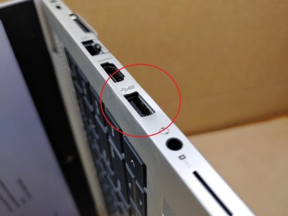 There is a small dent in the metal around the USB port on the right side (View image 9). Bottom plate is missing 1 rubber foot. Tested and Working. Boots to the BIOs. May have a few minor cosmetic scratches/scuffs. For your help