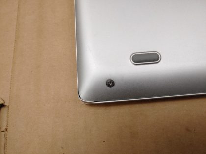 The front corner or the palmrest is slightly dented (View image 9). The screen has some light wear from the keyboard. Tested and Working. Boots to the BIOs. May have a few minor cosmetic scratches/scuffs. For your help