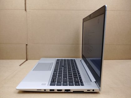 There is some very light screen wear from the keyboard. The hinges seem slightly loose on the inside of the hinge cover. There is a small blemish on the back corner (View image 9). Tested and Working. Boots to the BIOs. May have a few minor cosmetic scratches/scuffs. For your help