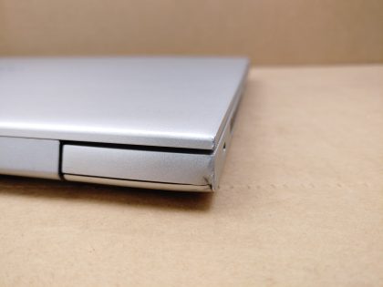 There is some very light screen wear from the keyboard. The hinges seem slightly loose on the inside of the hinge cover. There is a small blemish on the back corner (View image 9). Tested and Working. Boots to the BIOs. May have a few minor cosmetic scratches/scuffs. For your help