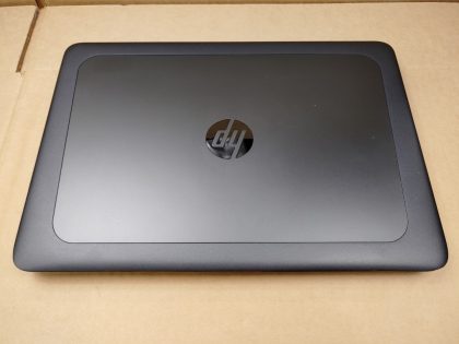 but stays in place with the screw (View image 9). There is a small crack in the plastic by the SC slot (View image 10). The front left corner of the palmrest looks to be slightly blemished (View image 1). Tested and Working. Boots to the BIOs. May have a few minor cosmetic scratches/scuffs. For your help