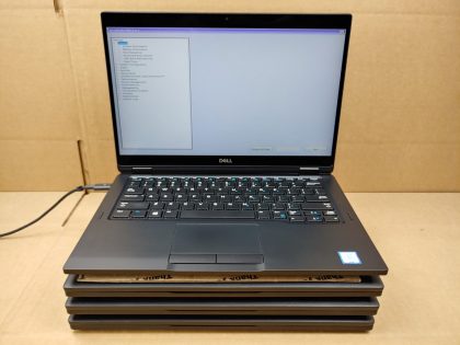 LOT of 4 - Tested and Working. Boots to the BIOs. All are exactly the same. One laptop has a small piece of the bottom plate broke off