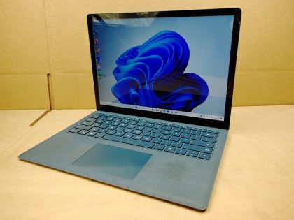 **NO POWER ADAPTER INCLUDED** There is some slight discoloration on the palmrest and some wear on the keys (View image 5). There is an adhesive stain on the lid from a sticker (View image 6). Fully Tested & 100% Functional ready to use out of the box