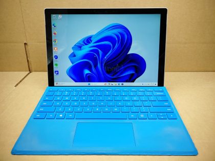 **NO POWER ADAPTER INCLUDED** The felt on the magnetic part of the keyboard cover is blemished (View image 7). Fully Tested & 100% Functional ready to use out of the box